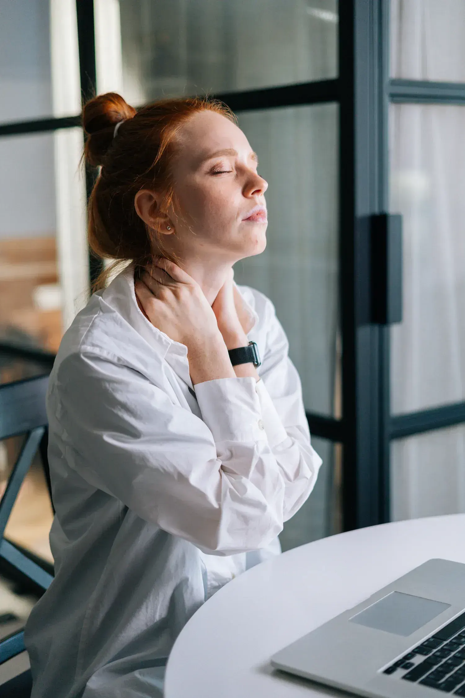 Patient consultation about neck pain red flags at Spine-Ability Apollo Beach